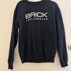 Brick Los Angeles Gildan Heavy Blend Black Crewneck Sweatshirt